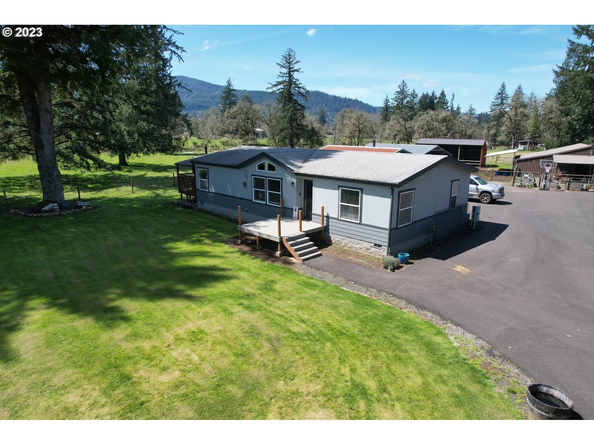 40766 North Mowitch Lyons, OR 97358 - Photo 2 of 31 a view of a patio in backyard