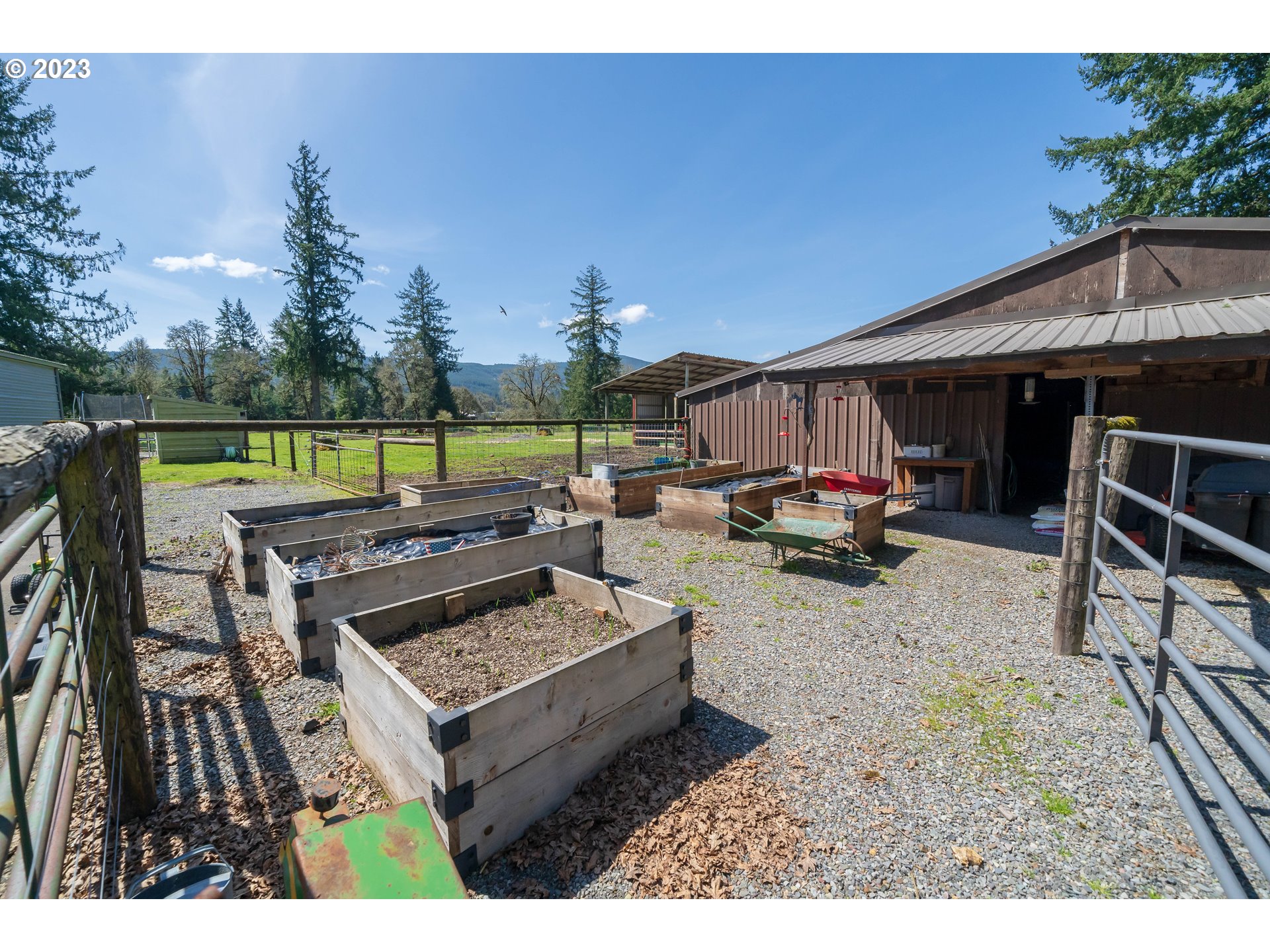 40766 North Mowitch Lyons, OR 97358 - Photo 22 of 31 a view of a backyard with sitting area