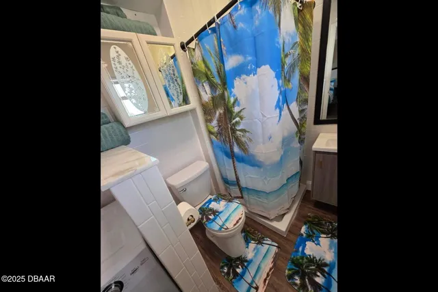 a view of a balcony with an outdoor space and seating area