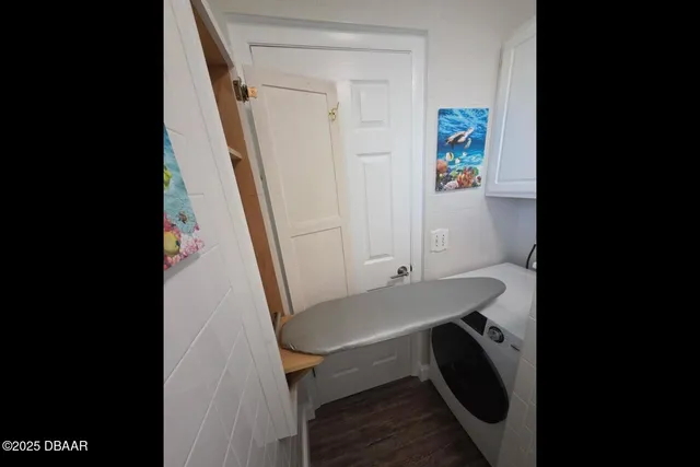 a view of a swimming pool and an outdoor seating