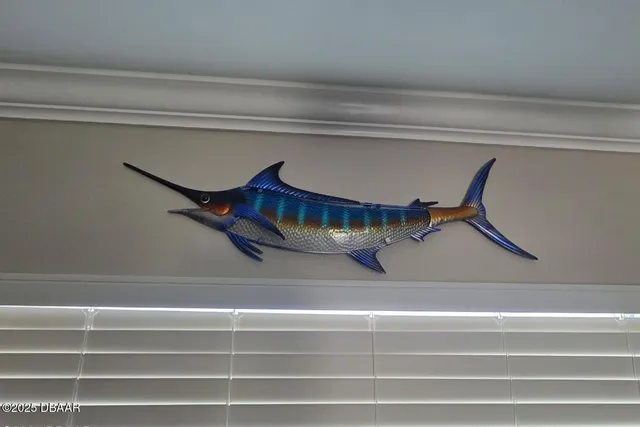 a view of a swimming pool with a lounge chair