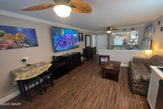 a view of a hallway with wooden floor and a floor to ceiling window
