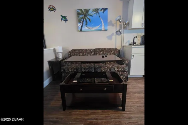 a utility room with sink dryer and washer