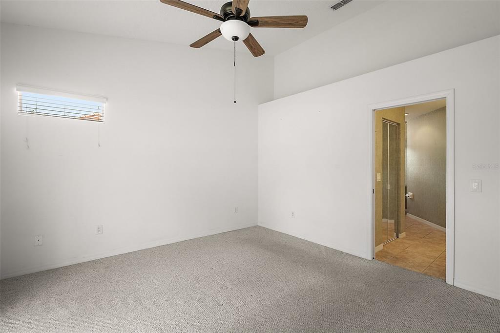 5368 Compass Point, Unit 202 Oxford, FL 34484 - Photo 18 of 33 a view of empty room with a fan