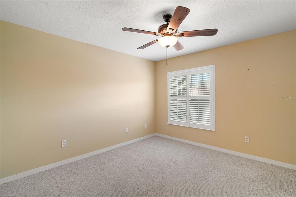 5368 Compass Point, Unit 202 Oxford, FL 34484 - Photo 24 of 33 a view of an empty room with a window