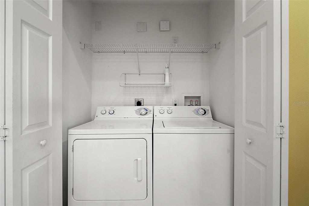 5368 Compass Point, Unit 202 Oxford, FL 34484 - Photo 26 of 33 a utility room with dryer and washer