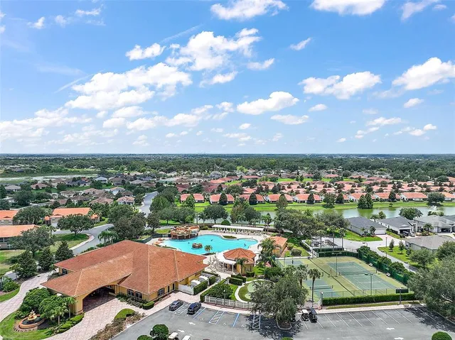 a view of a swimming pool with lounge chair
