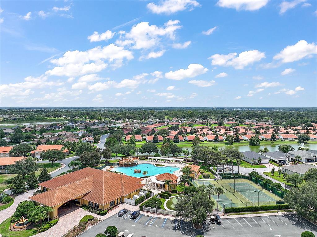 5368 Compass Point, Unit 202 Oxford, FL 34484 - Photo 29 of 33 an aerial view of a houses with a swimming pool