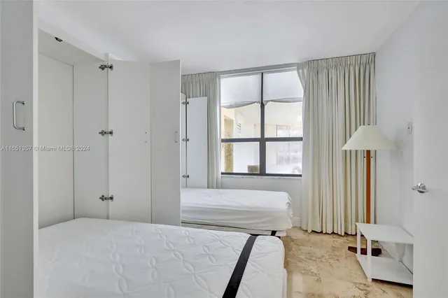 a room with gym equipment and a table