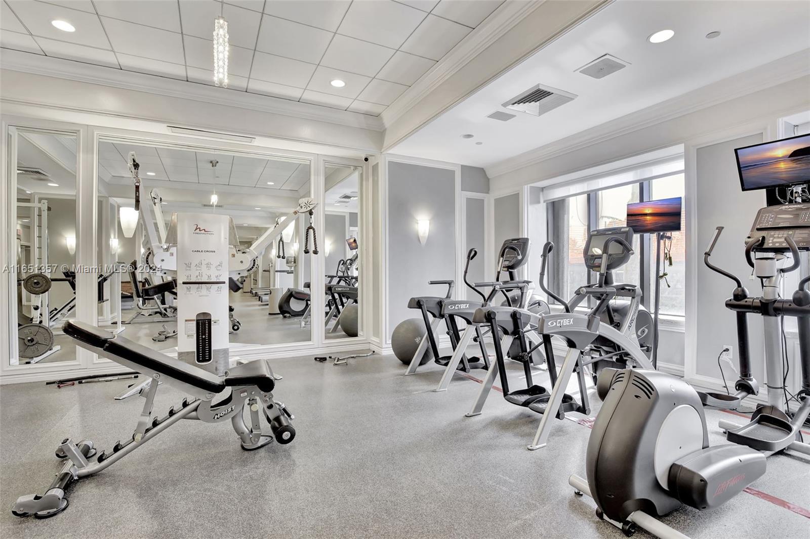 9801 Collins Avenue, Unit 3T Bal Harbour, FL 33154 - Photo 32 of 32 a view of a room with gym equipment