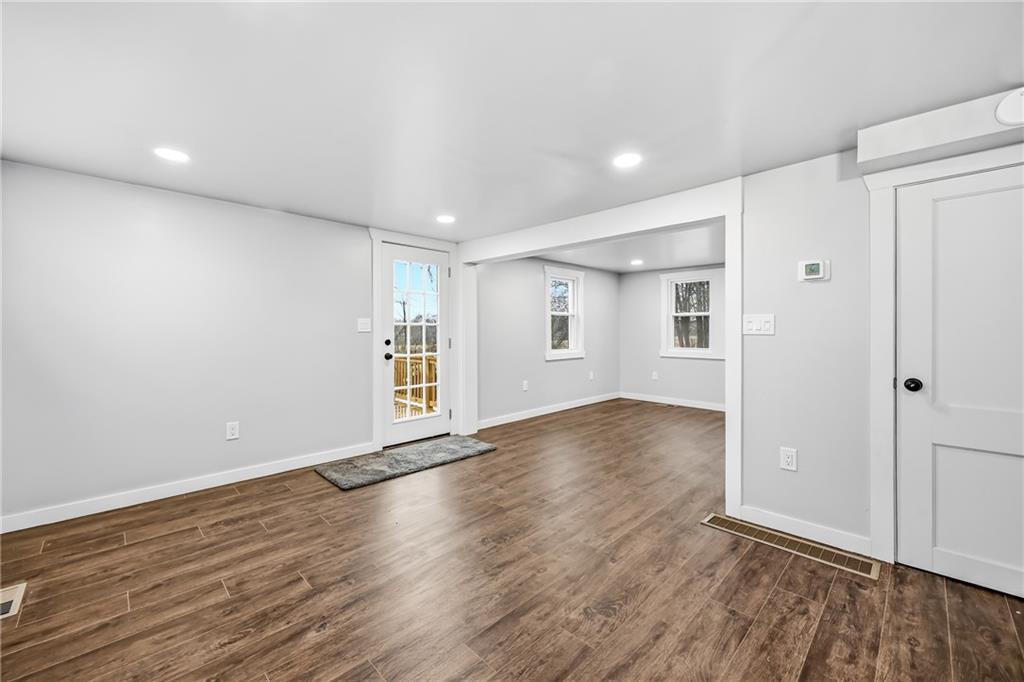 839 East Main St Extension Grove City, PA 16127 - Photo 16 of 41 a view of an empty room with wooden floor and closet