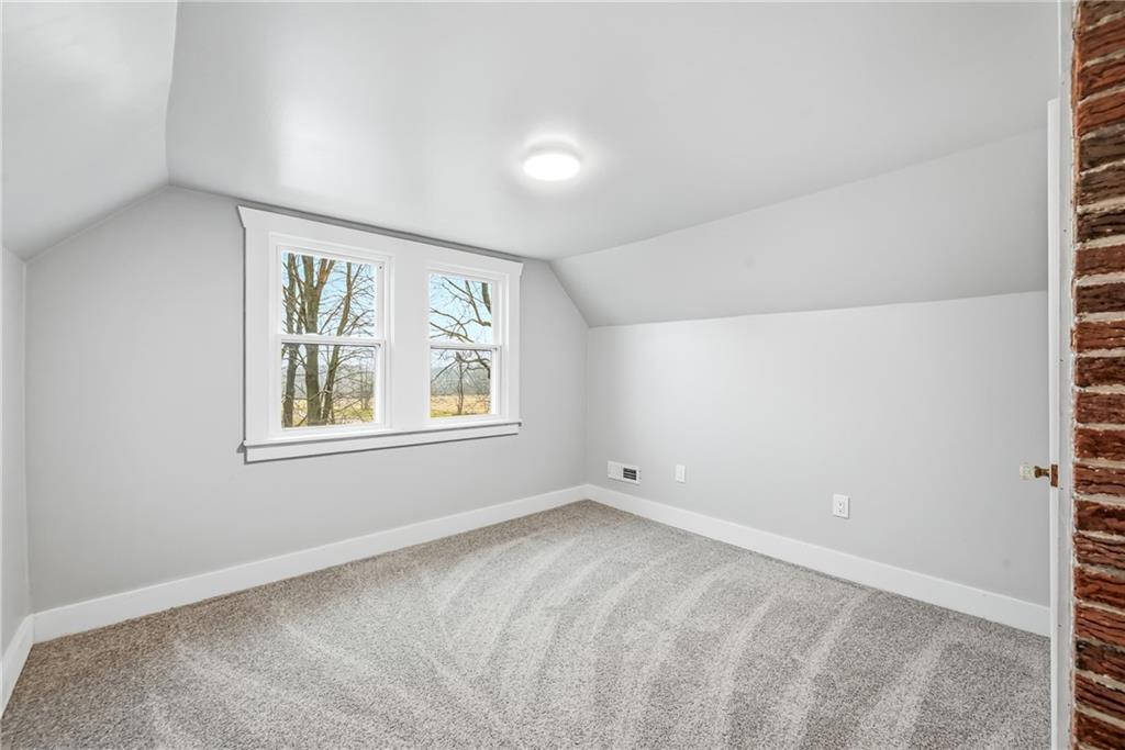 839 East Main St Extension Grove City, PA 16127 - Photo 25 of 41 an empty room with windows