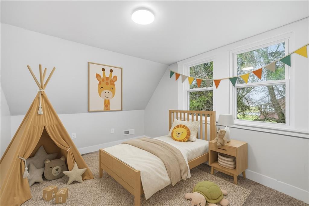 839 East Main St Extension Grove City, PA 16127 - Photo 28 of 41 a bedroom with a bed a painting on the wall and a large window