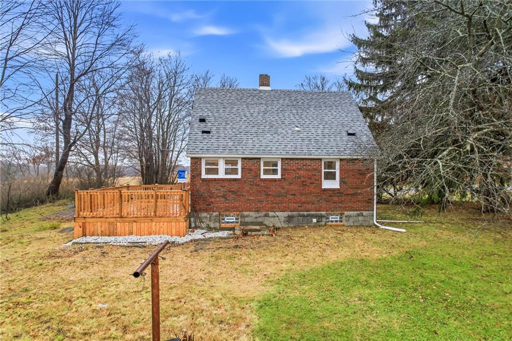 839 East Main St Extension Grove City, PA 16127 - Photo 34 of 41 a front view of a house with a yard