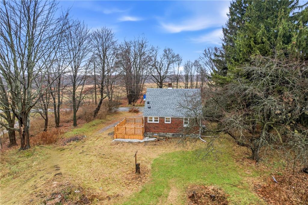 839 East Main St Extension Grove City, PA 16127 - Photo 36 of 41 a view of a yard with trees