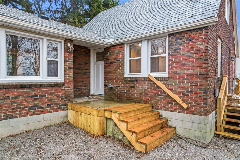 839 East Main St Extension Grove City, PA 16127 - Photo 5 of 41 a view of a house with a lounge chair and a barbeque grill