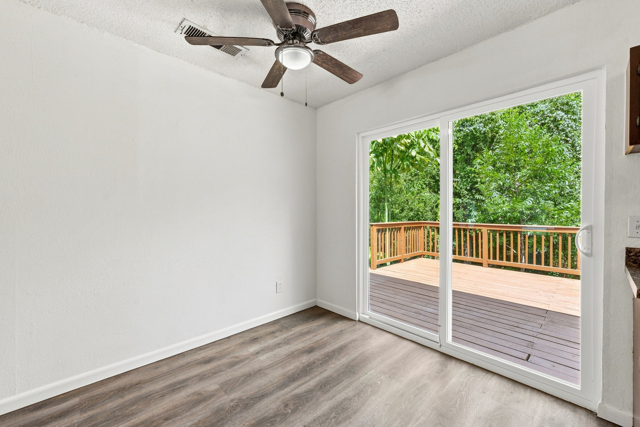 6712 Ripple Run Austin, TX 78744 - Photo 9 of 31 newer sliding glass door lets in abundance of light