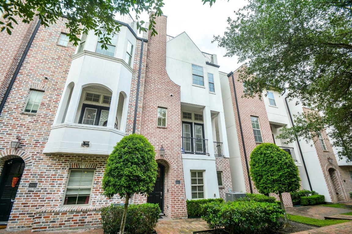 a front view of a multi story residential apartment buildings