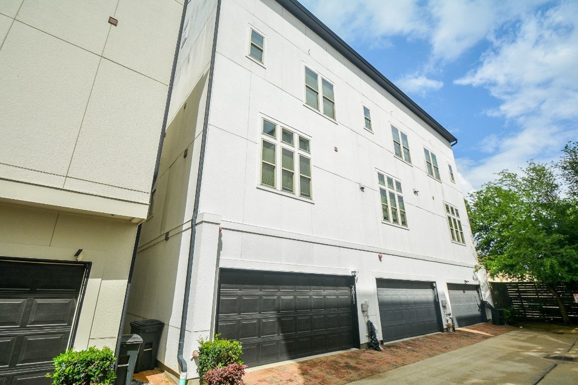 2017 Fannin Station Houston, TX 77045 - Photo 22 of 22 a front view of a house with garage