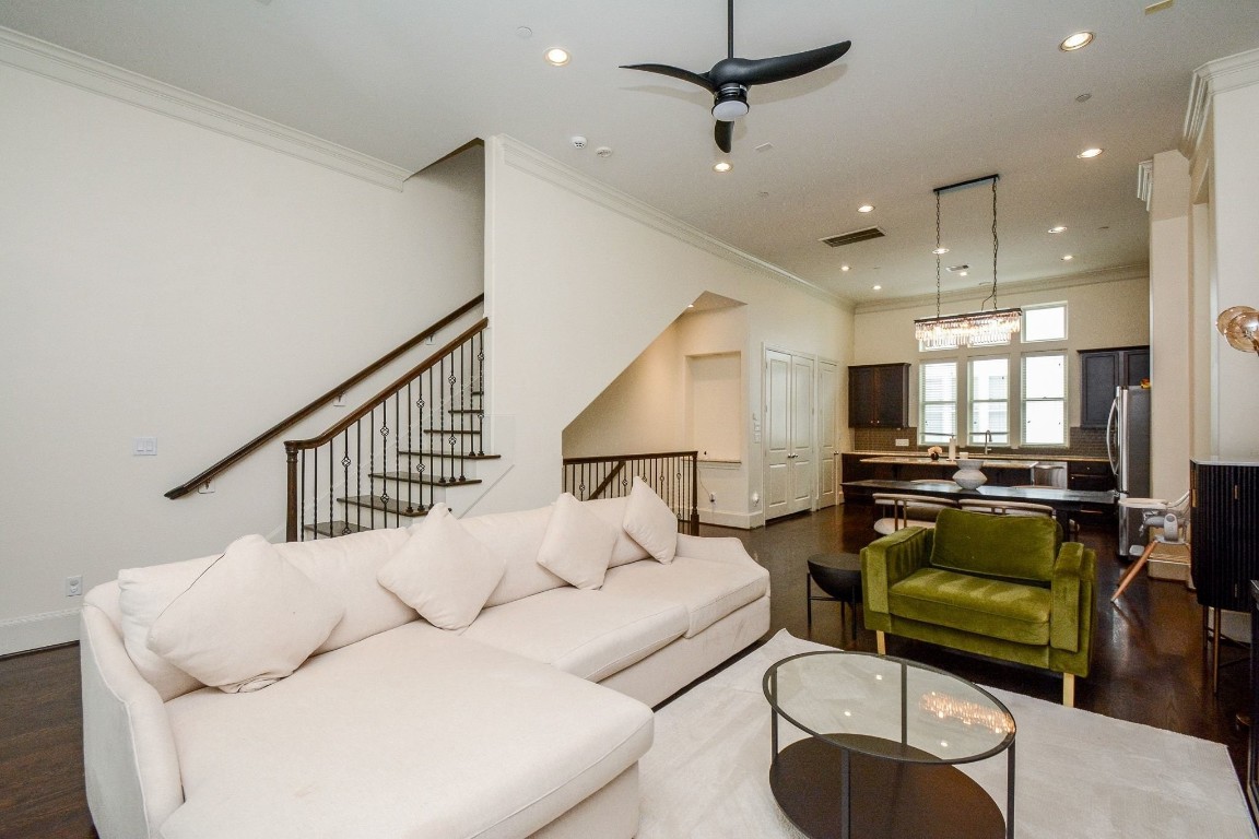 2017 Fannin Station Houston, TX 77045 - Photo 7 of 22 a living room with furniture and a wooden floor