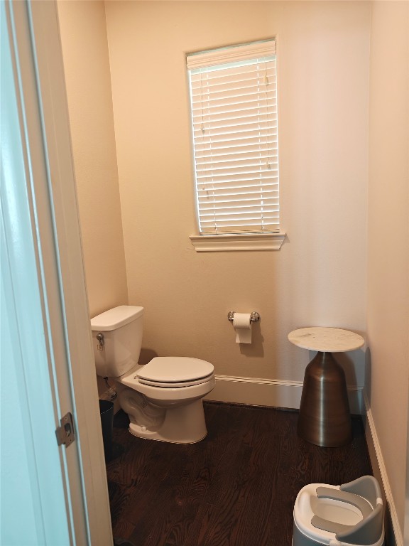 2017 Fannin Station Houston, TX 77045 - Photo 8 of 22 a white toilet sitting next to a window