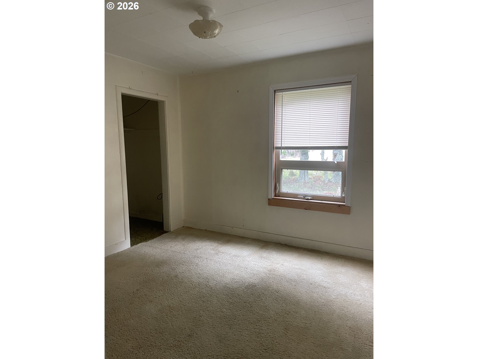 4045 Highway 101 Gearhart, OR 97138 - Photo 15 of 15 a view of an empty room with a window