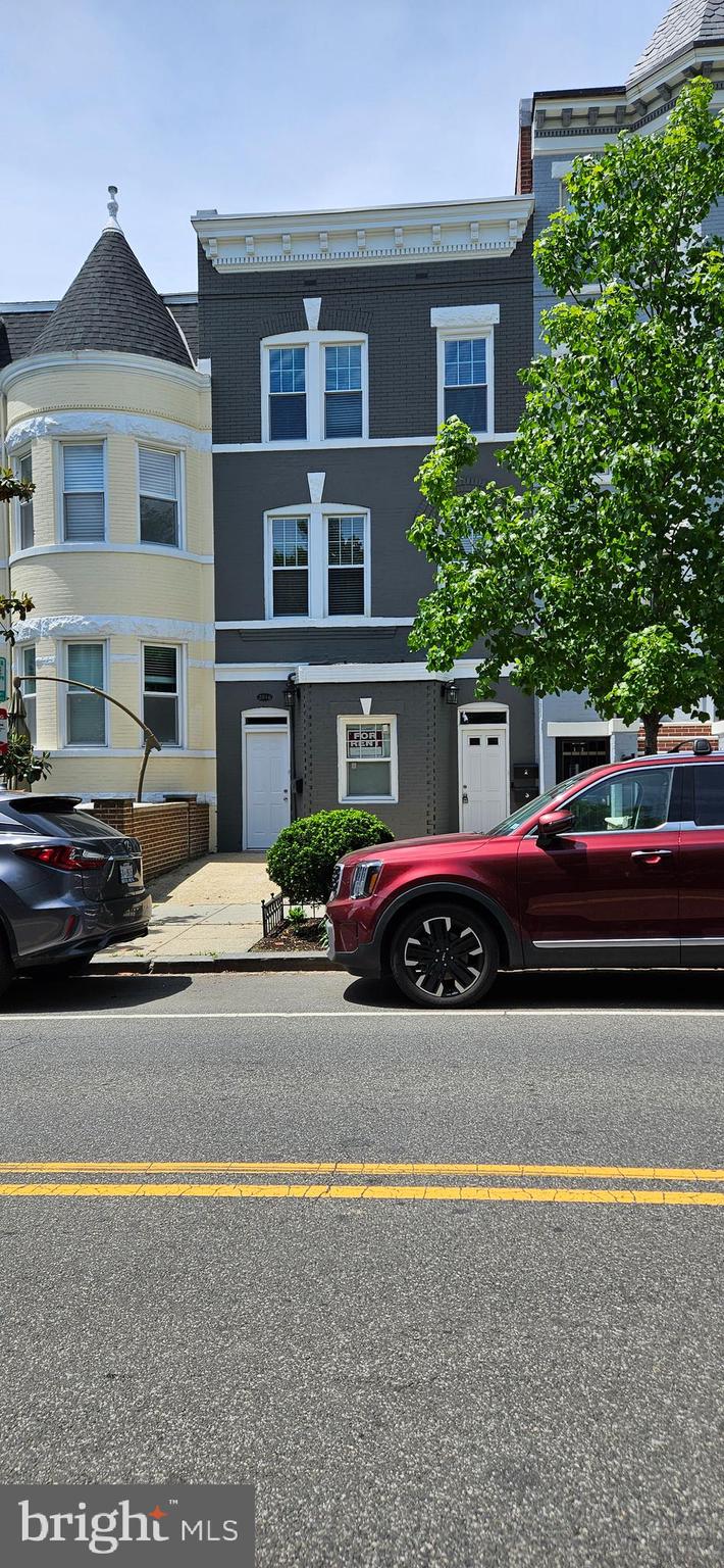 2016 1st Street Northwest, Unit 3 Washington, DC 20001 - Photo 1 of 18 a car parked in front of a house