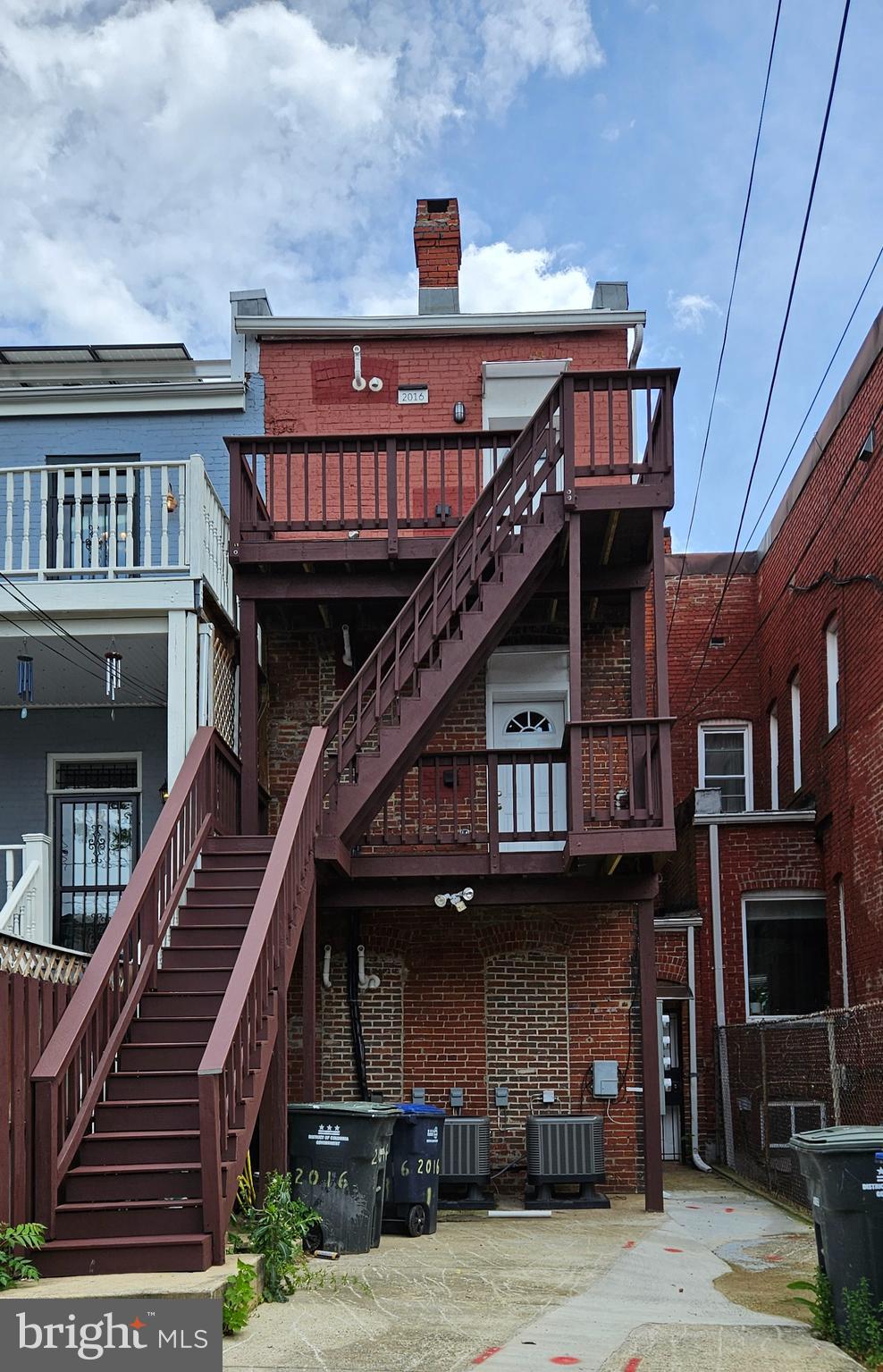 2016 1st Street Northwest, Unit 3 Washington, DC 20001 - Photo 17 of 18 a front view of a house with a balcony