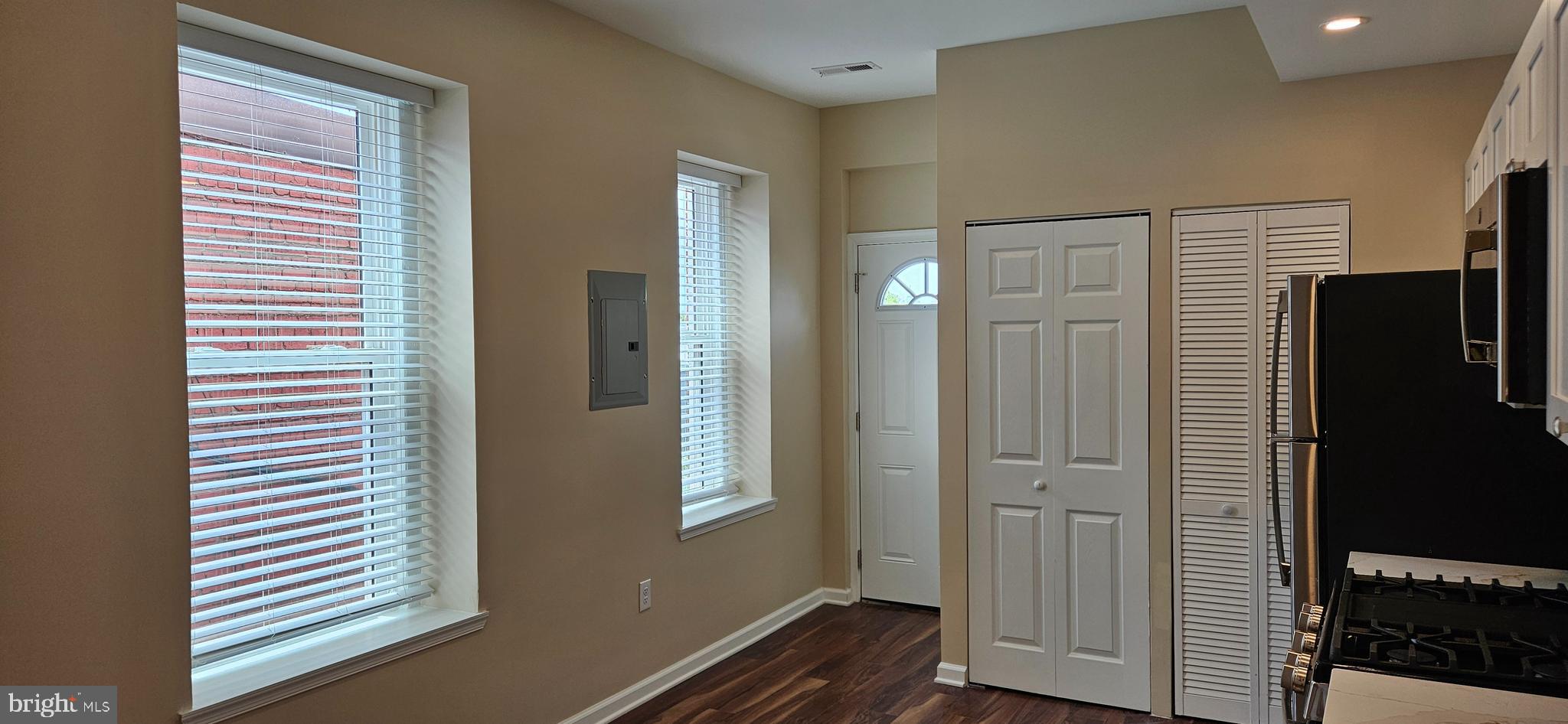 2016 1st Street Northwest, Unit 3 Washington, DC 20001 - Photo 4 of 18 a view of wooden floor and windows in a room