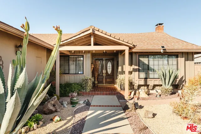 a view of a house with patio