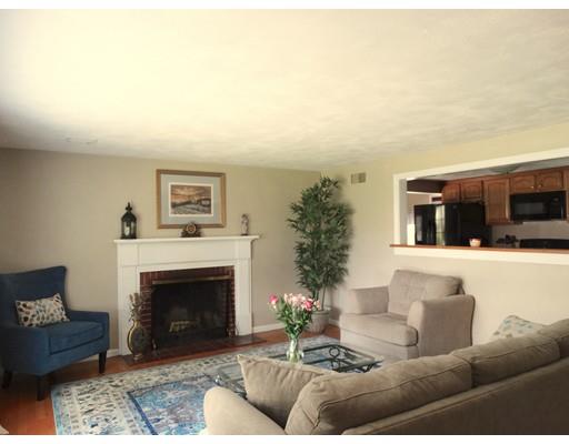73 Mary Coburn Road Springfield, MA 01129 - Photo 8 of 23 a living room with furniture and a fireplace