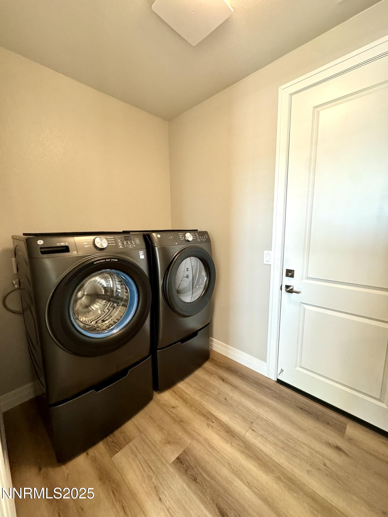 406 Heirloom Street Sparks, NV 89441 - Photo 13 of 16 a view of a hardwood floor in a room