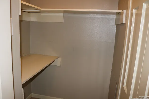 a bathroom with a sink and a window
