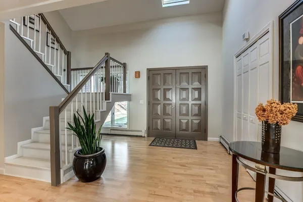 a view of entryway with livingroom and stairs