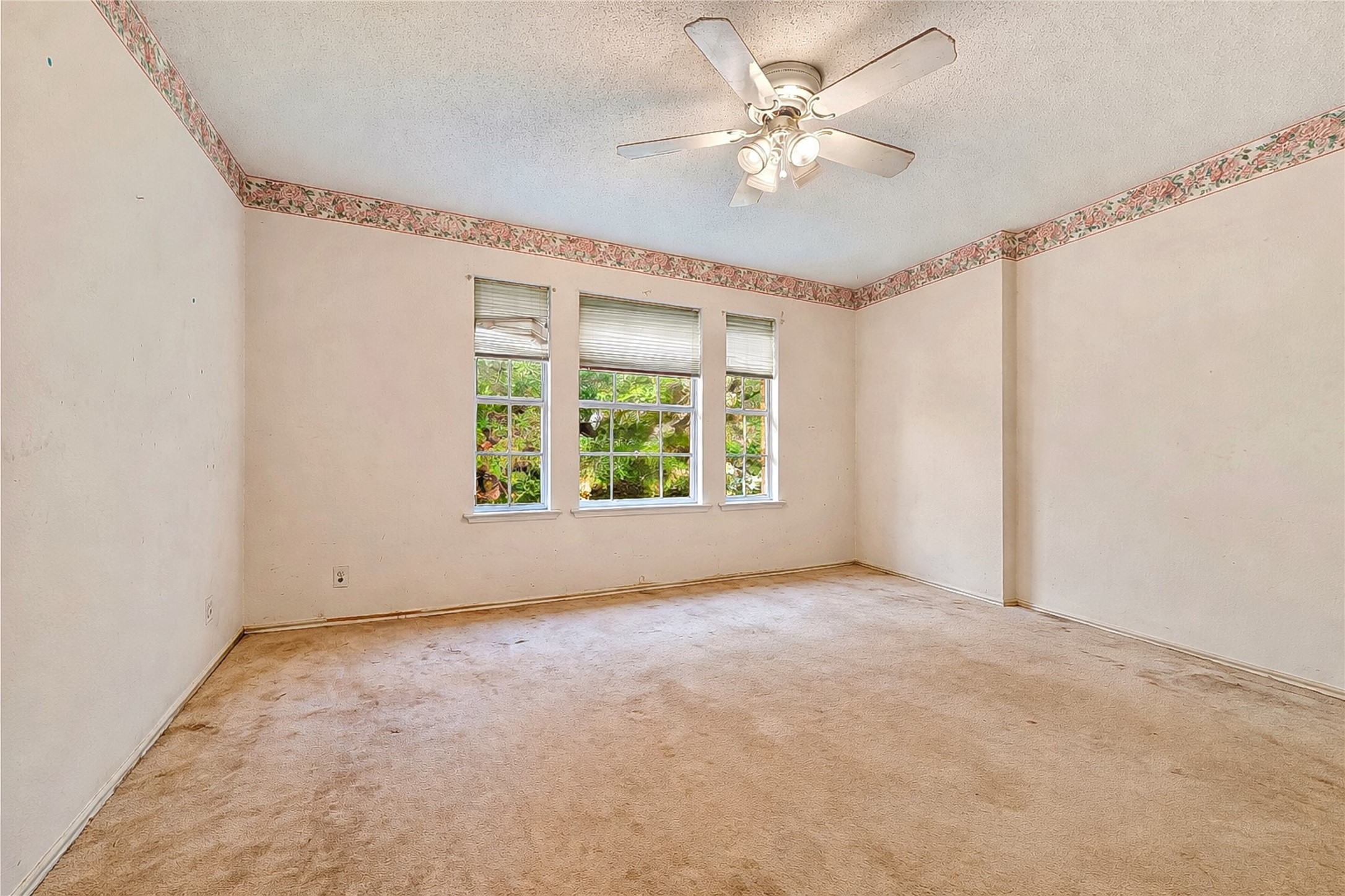 4008 Springwillow Lane Round Rock, TX 78681 - Photo 17 of 29 Virtually staged - Bedroom #4 featuring ceiling fan and a textured ceiling