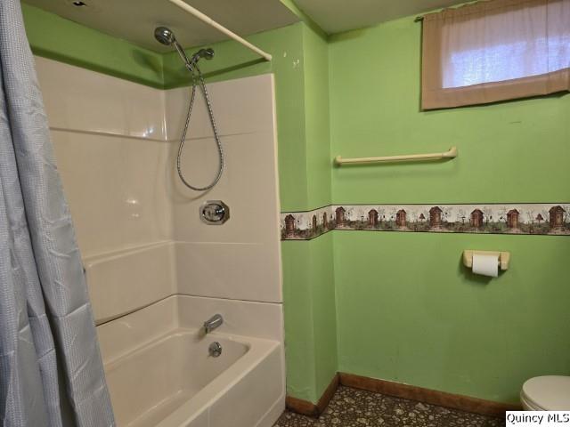 6 Westview Drive Hamilton, IL 62341 - Photo 19 of 30 a bathroom with a shower and a white bath tub