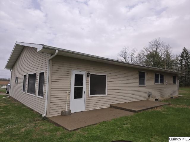 6 Westview Drive Hamilton, IL 62341 - Photo 29 of 30 a backyard of a house with table and chairs