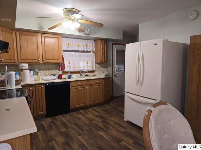 6 Westview Drive Hamilton, IL 62341 - Photo 7 of 30 a kitchen with a sink a refrigerator and wooden floor