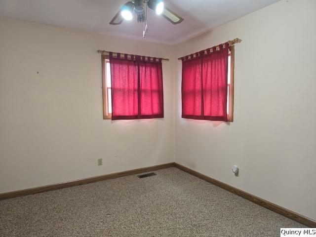 6 Westview Drive Hamilton, IL 62341 - Photo 8 of 30 an empty room with windows