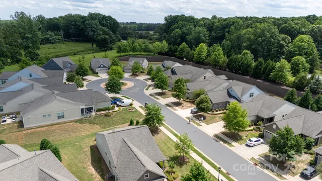 an aerial view of a house with a garden