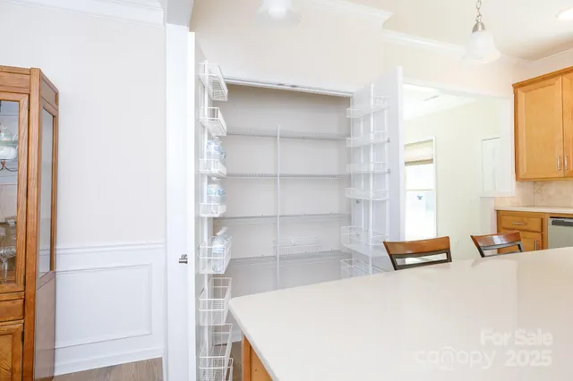 a bedroom with a bed and a cabinets