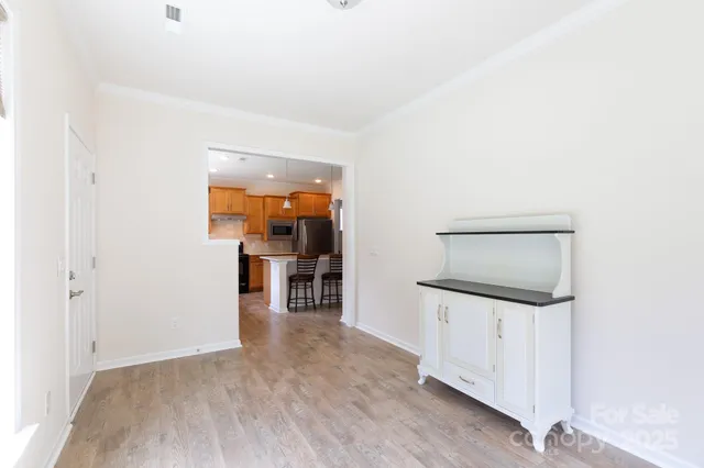 a hallway with washer and dryer