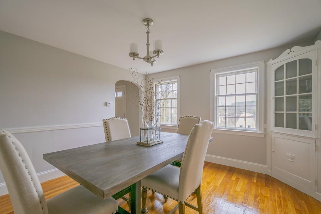 5 Constitution Road Lexington, MA 02421 - Photo 11 of 42 a view of a dining room with furniture and window