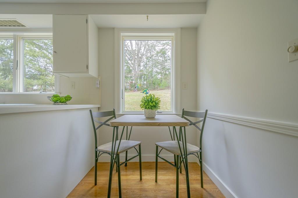 5 Constitution Road Lexington, MA 02421 - Photo 17 of 42 a view of a dining room with furniture window and outside view