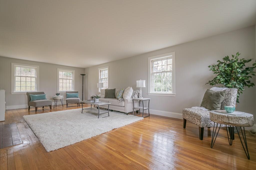 5 Constitution Road Lexington, MA 02421 - Photo 2 of 42 a living room with furniture and a table