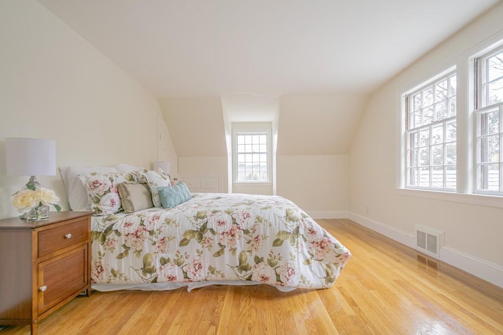 5 Constitution Road Lexington, MA 02421 - Photo 26 of 42 a bedroom with a bed and window