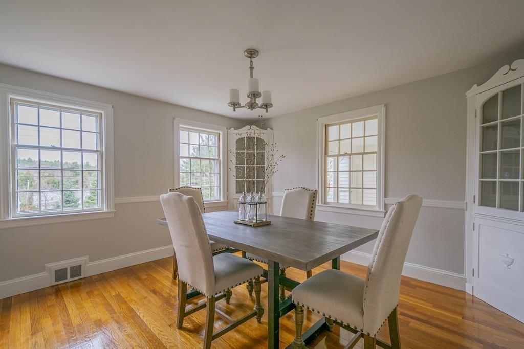 5 Constitution Road Lexington, MA 02421 - Photo 8 of 42 a view of a dining room with furniture window and outside view