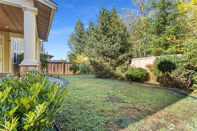 a view of a garden with a building