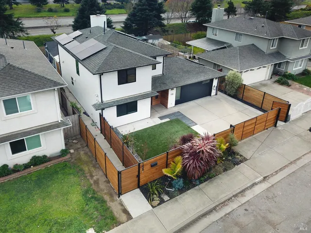 a bathroom with a toilet sink and shower