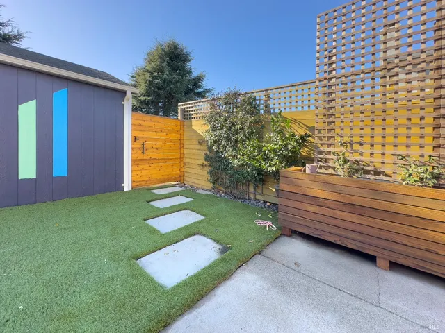 a bathroom with a sink and a shower